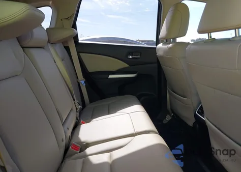 2016 Honda Cr-V Touring z USA, uszkodzony, nr VIN 5J6RM4H90GL104299